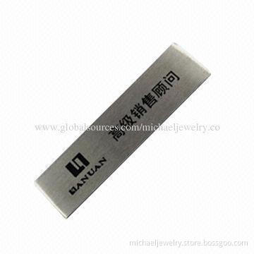 Name badges with name and company logo